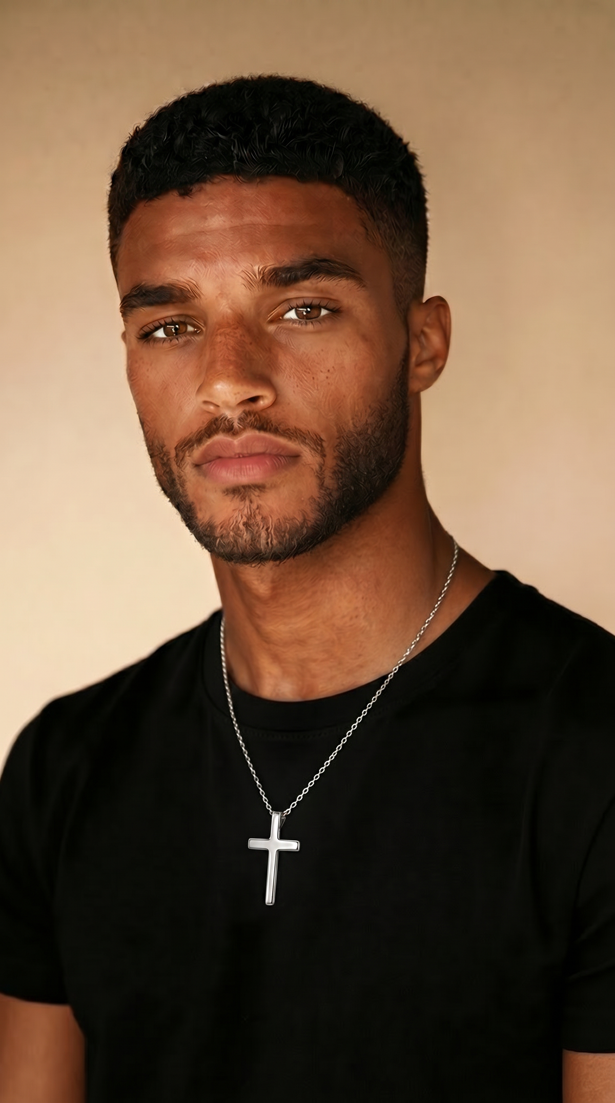 Man wearing the plain cross chain